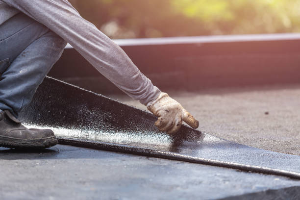 Professional Waterproofing technician working in Western Springs, IL